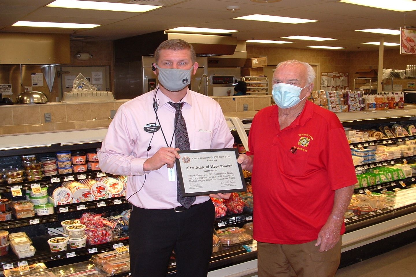 Delbert McCoy presents Certificate of Appreciation to Mr. Kris Kenny of the Food Lion Store on W. Cornelius Blvd, Lillington for their support of the November 2020 Buddy Poppy Drive.